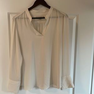 Express long sleeved blouse. Can roll sleeves up. Size large